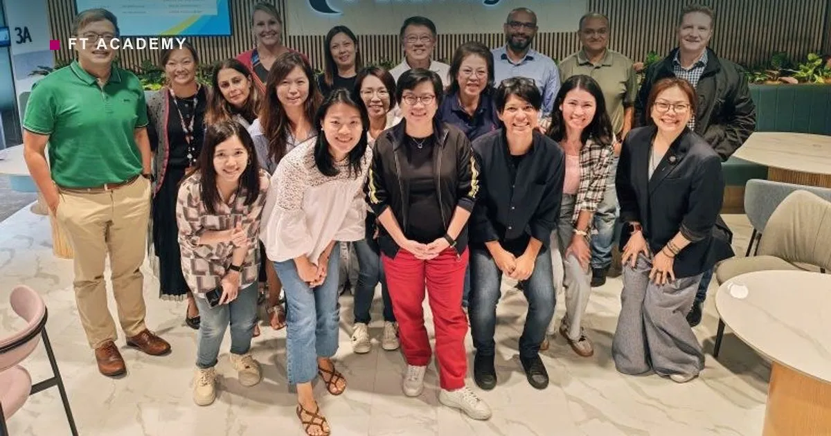 FTA facilitators with the HSBC COO office team at NTUC LearningHub after an AI applications masterclass.